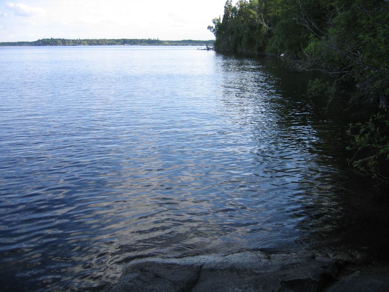 Falcon Lake in Manitoba's Whiteshell Provincial Park — the boreal-shield region where Michalak, an amateur prospector from Winnipeg, said he leaned against a craft and felt the heat sear through his cap and shirt.