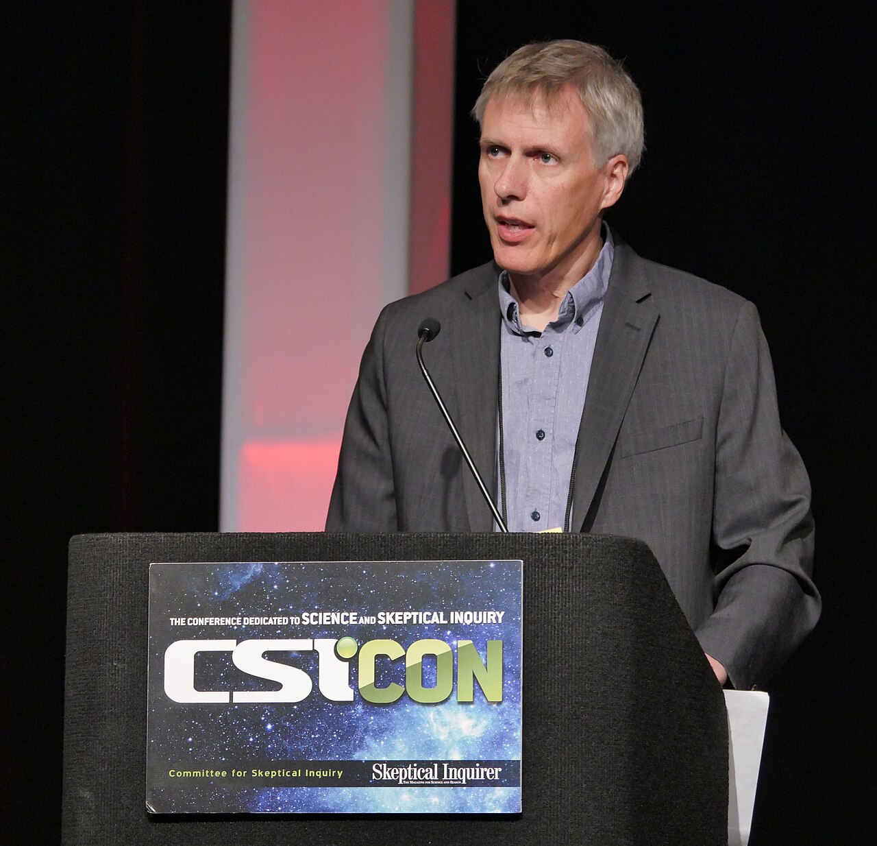 Mick West presenting at CSICon 2018 — the skeptical-inquiry annual conference where he gave a session on his frame-by-frame methodology for analyzing viral physical-evidence claims.