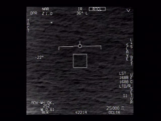 A still from the Pentagon-released 'Go Fast' video — the apparent sea-skimming object whose true altitude (~13,000 feet per skeptical reconstructions) is the case's open question.