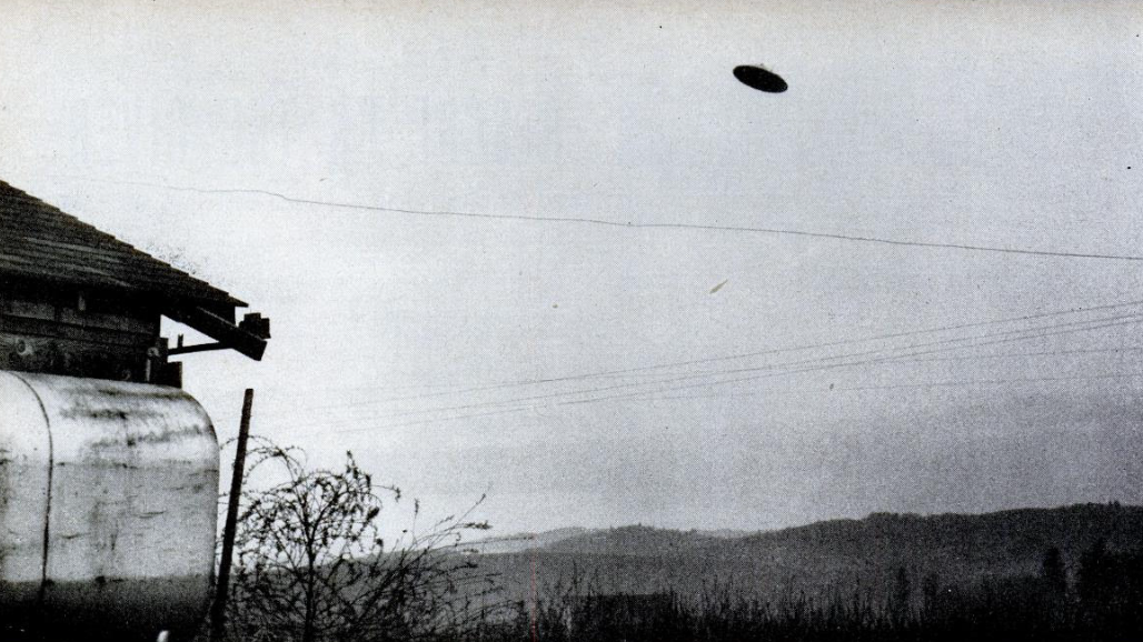 The first of Paul Trent's two 11 May 1950 photographs of a metallic disc over his McMinnville, Oregon farm — the case the Condon Committee's photo-analyst endorsed in stronger language than any other.