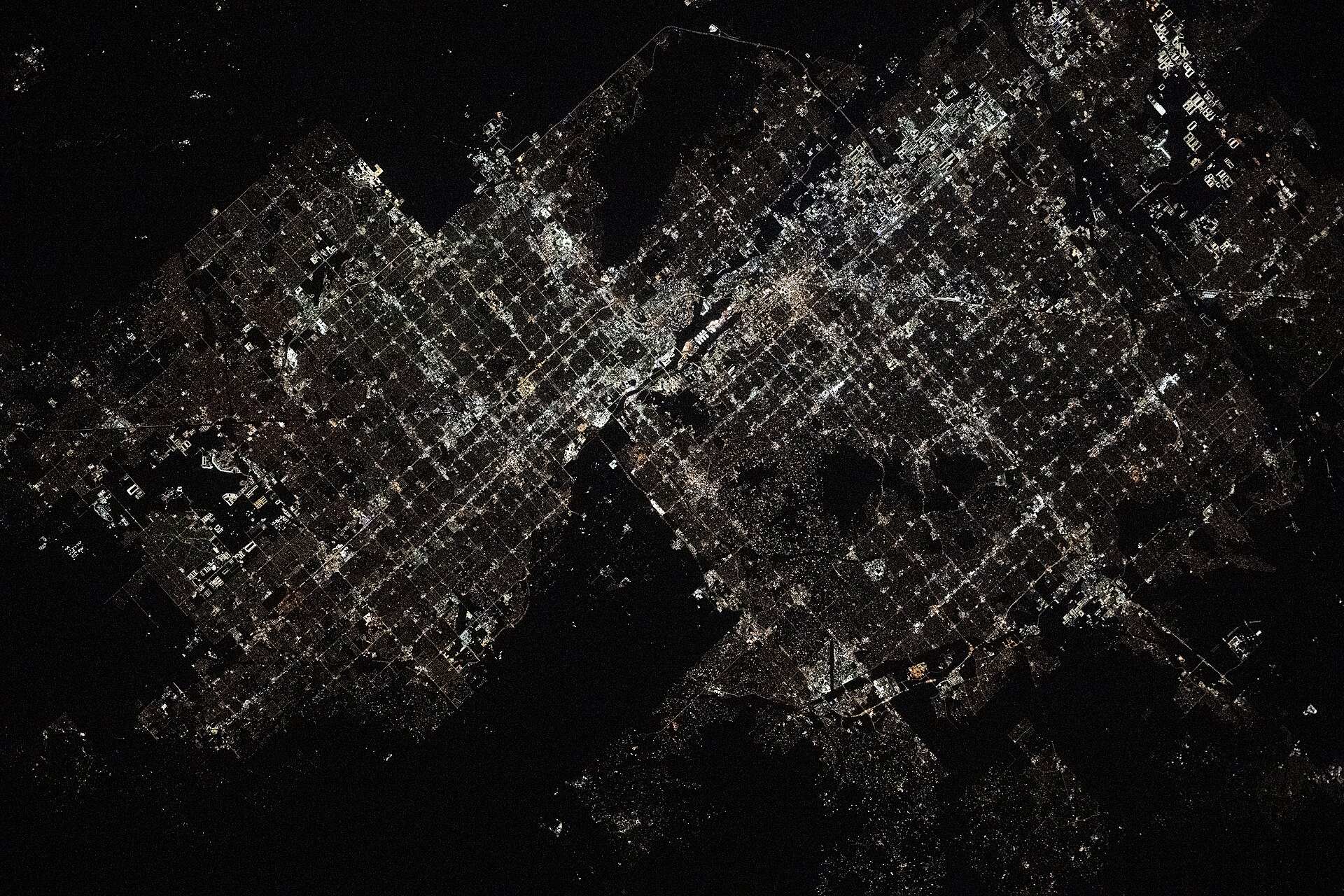 Phoenix, Arizona, photographed from the ISS — the metro area where tens of thousands of witnesses reported the lights.