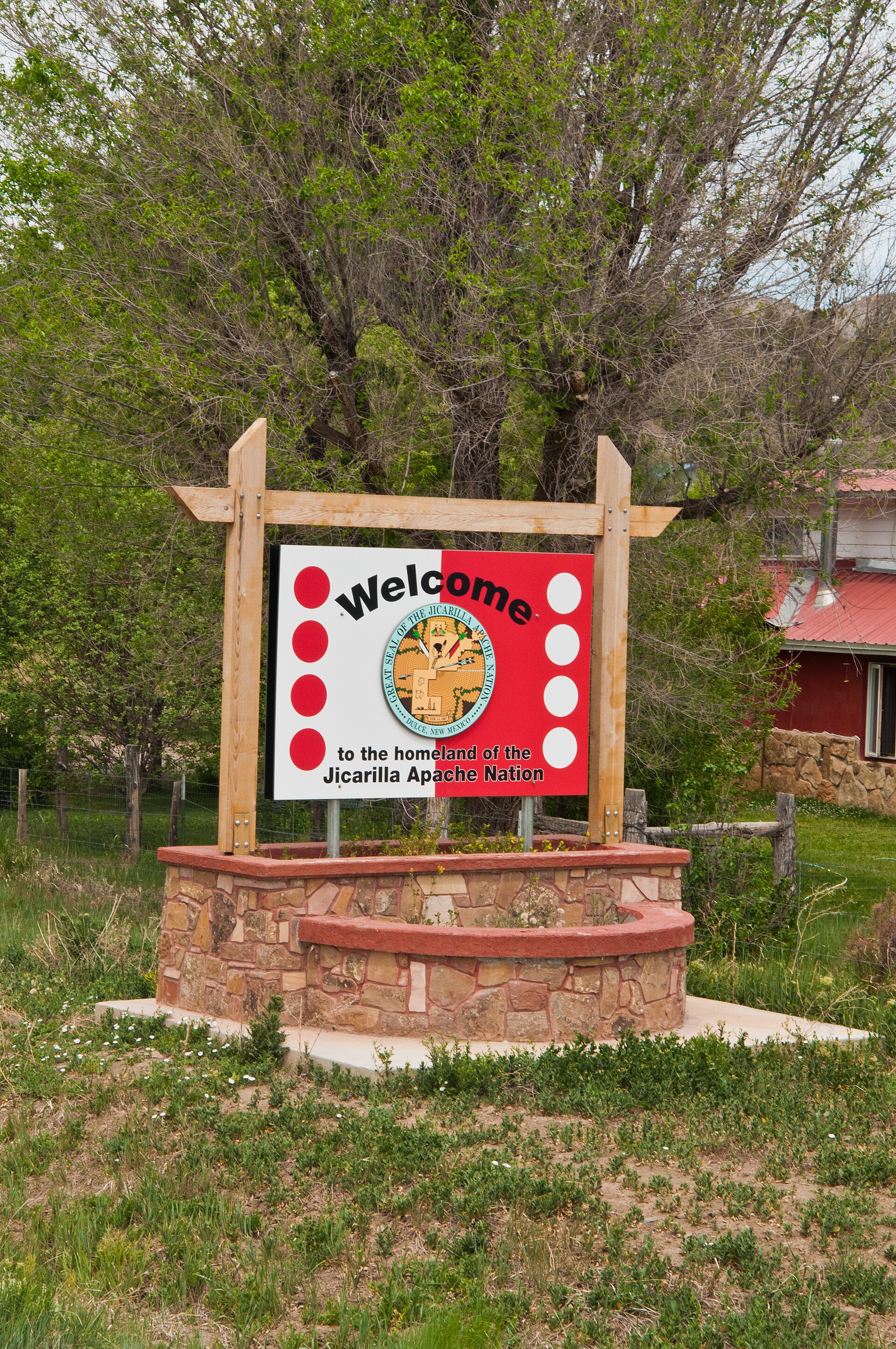 The welcome sign at Dulce, New Mexico — capital of the Jicarilla Apache Nation. Paul Bennewitz's 1979 claims of an underground joint human-alien base inside Archuleta Mesa entered ufology through this small town.