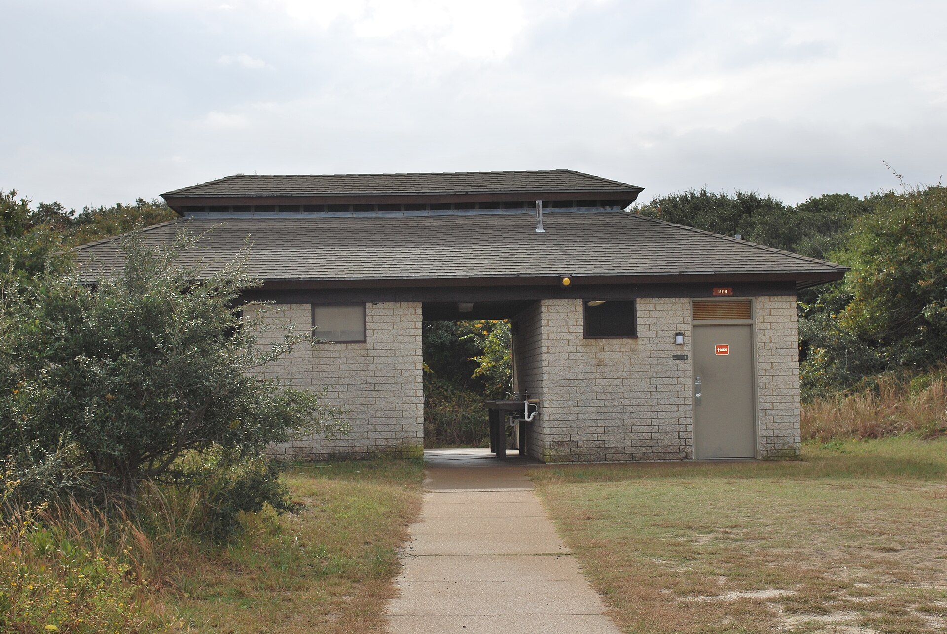 Bathhouse at False Cape State Park — accessible only by foot, bike, boat, or a tram through the Back Bay Wildlife Refuge. The seven-mile barrier-island wilderness is the longest stretch of undeveloped Atlantic coastline between the Outer Banks and the Jersey Shore.