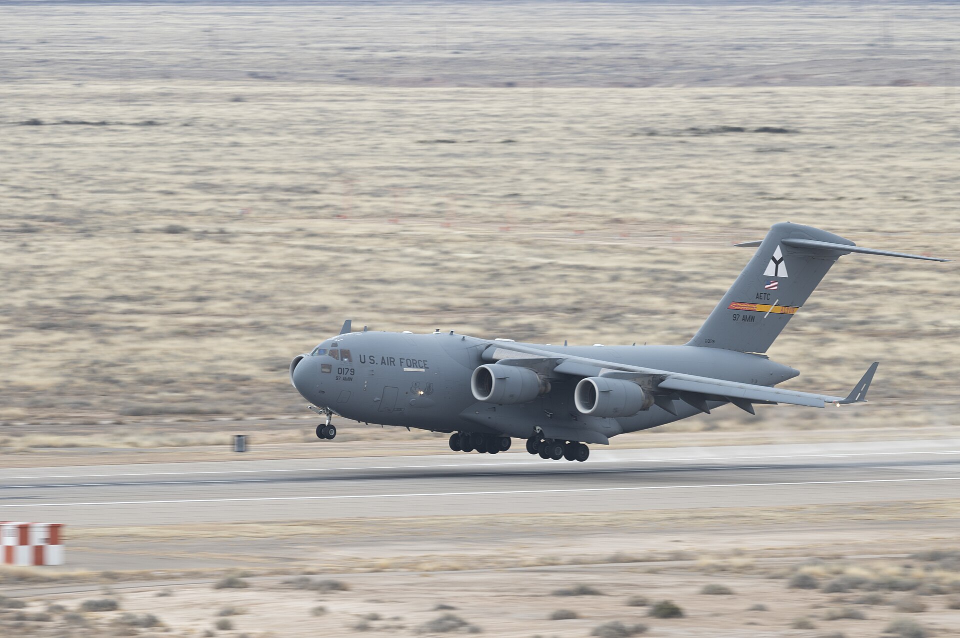 A C-17 Globemaster landing at Holloman, March 2023. The 1973 'Holloman alien meeting' claim — popularized in the 1988 TV broadcast UFO Cover-Up Live — has never been confirmed by USAF records.