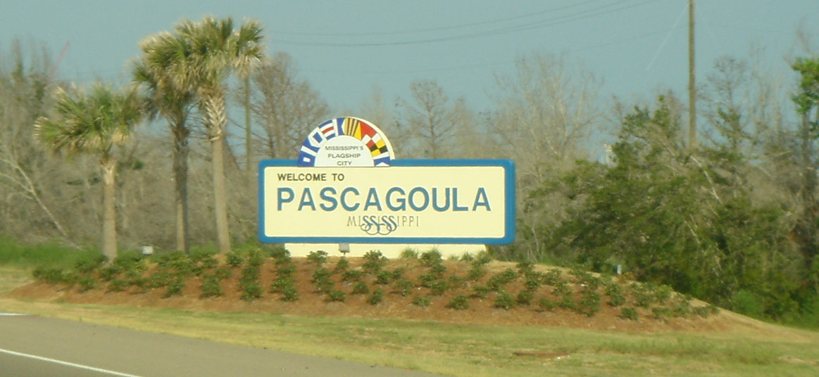 The town sign at Pascagoula, Mississippi. The Hickson-Parker incident — the most thoroughly investigated 'abduction' case of the 1970s — was supported by polygraph results, an unexplained military radio call, and a UFO sighting by Mobile police chief Vernon Boyer that same night.