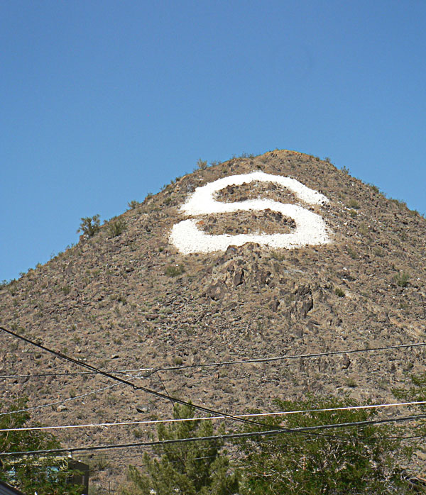 South Mountain rising over Phoenix neighborhoods. Witnesses reported the V-formation tracked from Henderson, Nevada south through Prescott, Phoenix, and onward to Tucson — a 300-mile silent transit, almost too long to be coordinated aircraft.