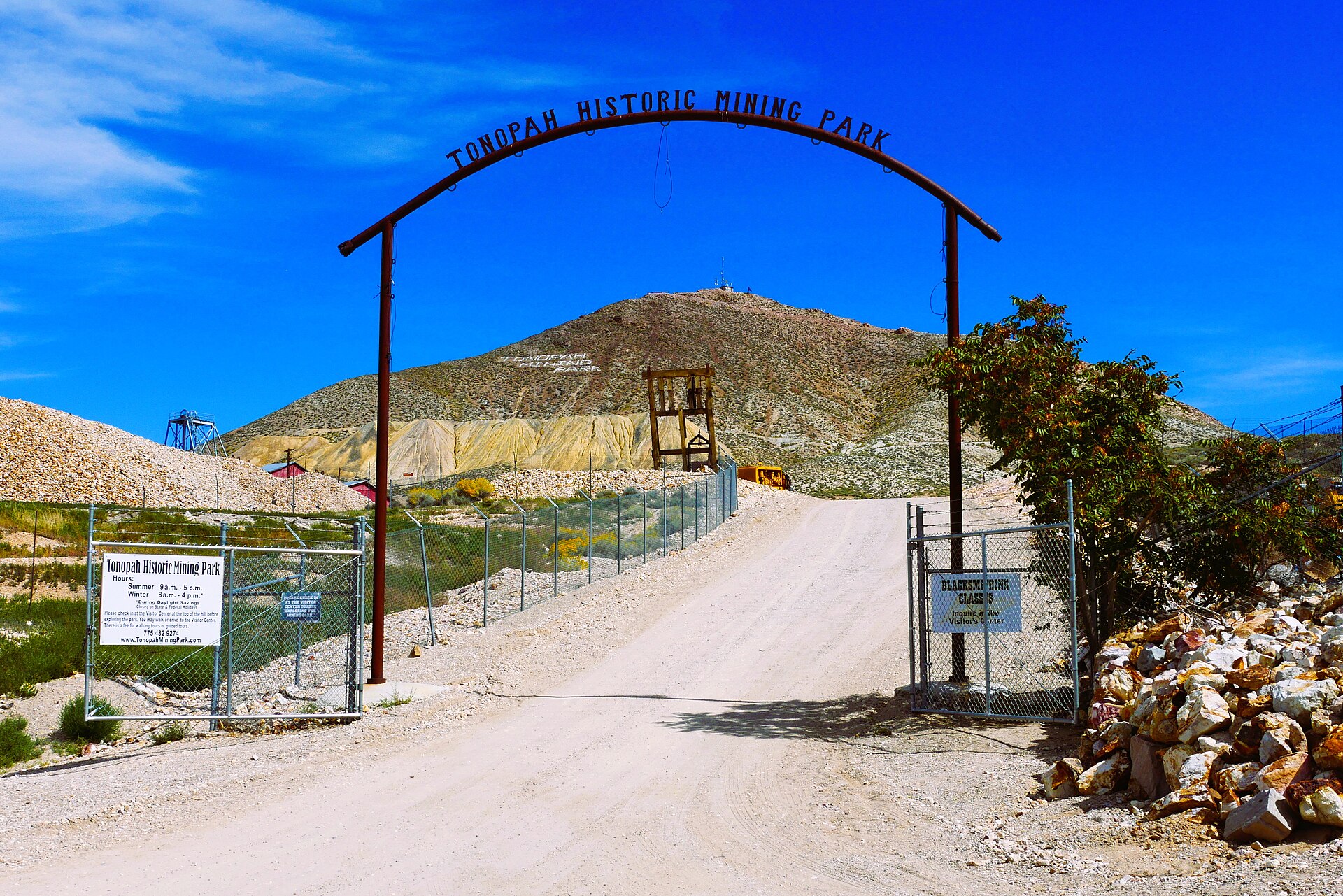 The entrance to Tonopah Historic Mining Park. The dark ridges visible east of town hide the Tonopah Test Range — and beyond it, the Nellis Air Force Range and Area 51. Tonopah is the closest civilian settlement to both.