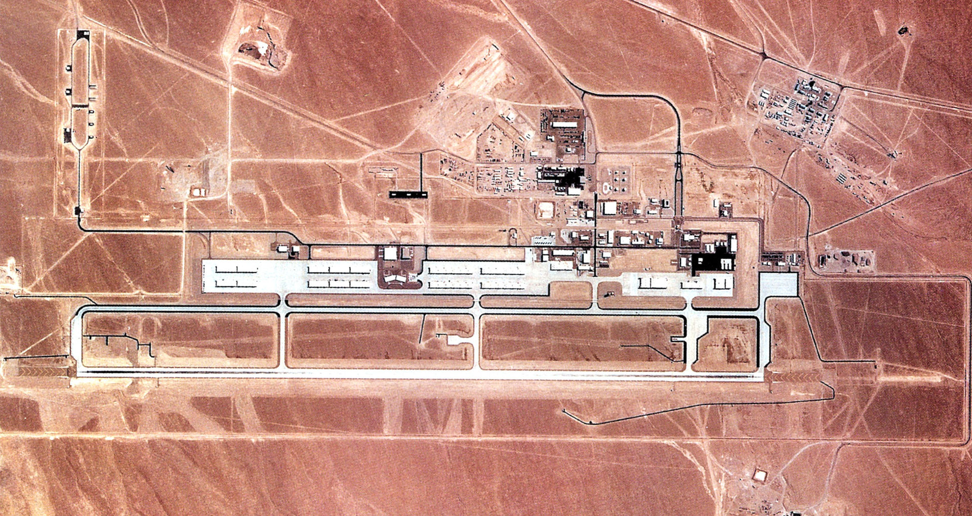 Tonopah Test Range Airport, 1990 — the secret base where the F-117A Nighthawk flew its first operational years entirely at night, hidden from satellites.
